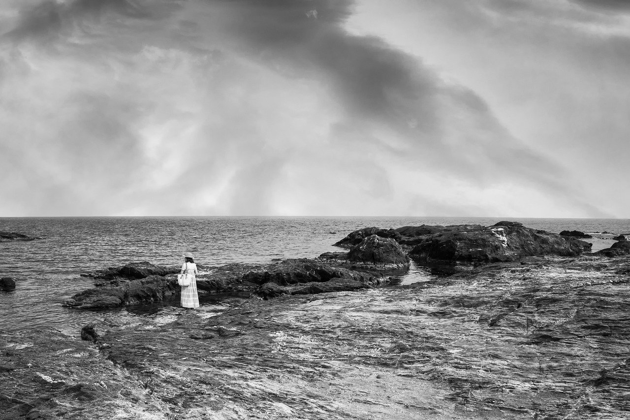 woman, sea, rocks-8500170.jpg